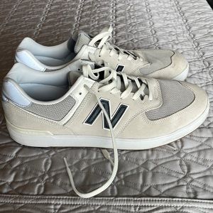 Mens casual new balance sneakers, worn once. Excellent condition. Side 12W